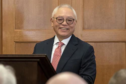 Sidney Lu, CEO of Foxconn Interconnect Technology Ltd., takes to the podium at a signing ceremony at Engineering Hall in July.