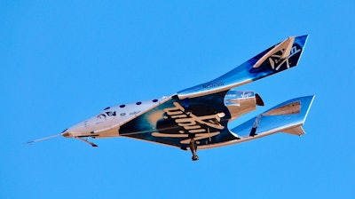 In this Dec. 13, 2018 file photo, Virgin Galactic aircraftVSS Unity reaches space for the first time during its fourth powered flight from Mojave Air and Space Port, Calif. Boeing plans to invest $20 million in Virgin Galactic as the space tourism company nears its goal of launching passengers on suborbital flights.