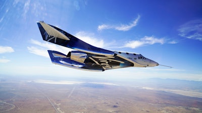 In this May 29, 2018 photo provided by Virgin Galactic, the VSS Unity craft flies during a supersonic flight test. Virgin Galactic said Wednesday, Oct. 2, 2019 that it has been contracted by the Italian air force for a suborbital research flight aboard its winged rocket ship.