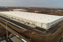 In this Jan. 27, 2018, file photo 975,000 square foot warehouse sits in Staten Island, New York. Warehouse properties are surging in value as people increasingly shop online and the popularity of quick delivery surges. Controlling warehouses in multiple locations allows companies like Amazon.com to package, ship and deliver goods often within hours of an order.