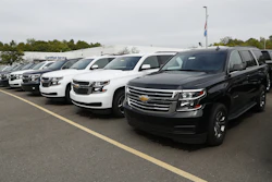 In this Sept. 30, 2019, photo, a row of Chevrolet Suburban vehicles are shown at Wally Edgar Chevrolet in Orion Township, Mich.