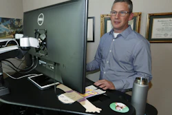 In this July 1, 2019, photo, software engineer Joe Wilson works in his home in Highlands Ranch, Colo.