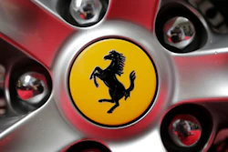 This Oct. 9, 2017, file photo shows a Ferrari logo on a car outside the New York Stock Exchange.