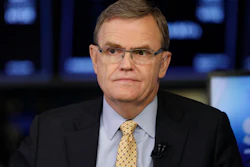 In this Sept. 14, 2018, file photo, United Parcel Service Chairman and CEO David Abney is interviewed on the floor of the New York Stock Exchange.