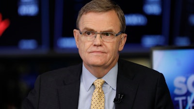 In this Sept. 14, 2018, file photo, United Parcel Service Chairman and CEO David Abney is interviewed on the floor of the New York Stock Exchange.