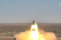 In this image, made from a video provided by NASA, Boeing tests the launch abort system of the Starliner capsule in White Sands Missile Range, N.M., Nov. 4, 2019.