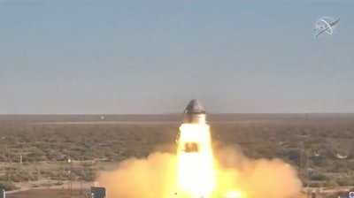 In this image, made from a video provided by NASA, Boeing tests the launch abort system of the Starliner capsule in White Sands Missile Range, N.M., Nov. 4, 2019.