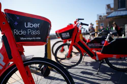 In this May 28, 2019, file photo, Jump electric bike-share bicycles by Uber are seen along Mission Beach boardwalk in San Diego.