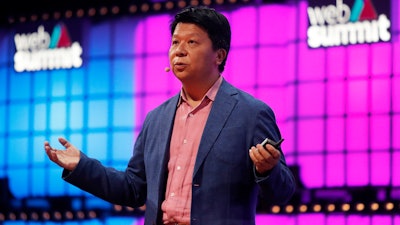 Huawei Rotating Chairman Guo Ping addresses the Web Summit technology conference in Lisbon, Nov. 4, 2019.