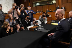 In this Oct. 29, 2019, file photo, Boeing President and CEO Dennis Muilenburg, second from right, and Boeing Commercial Airplanes Vice President and Chief Engineer John Hamilton, right, on Capitol Hill.