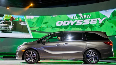 In this Jan. 9, 2017, file photo, a new Honda Odyssey minivan is unveiled at the North American International Auto Show in Detroit.