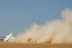 In this handout photo provided by Bloodhound, the vehicle speeds along the Hakskeenpan track in South Africa, Nov. 8, 2019.