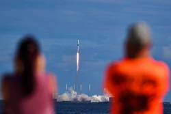 Julie and Doc Todd watch the launch SpaceX from KARS Park in Florida, Nov. 11, 2019.