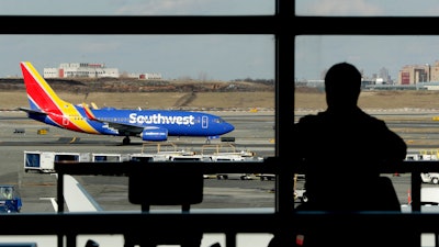 In this Jan. 25, 2019, file photo, a Southwest Airlines jet moves on the runway at LaGuardia Airport in New York.