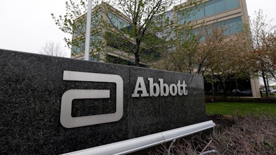 This April 28, 2016, file photo shows a sign at an Abbott Laboratories campus facility in Lake Forest, Ill.