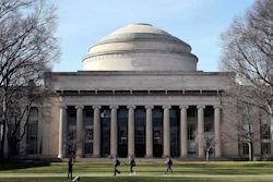 In this April 3, 2017, file photo, students walk past the 'Great Dome' atop Building 10 on the Massachusetts Institute of Technology campus in Cambridge, Mass.