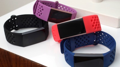 In this Aug. 16, 2018, file photo, the new Fitbit Charge 3 fitness trackers with sport bands are displayed in New York.