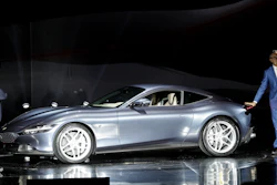Ferrari Chief Marketing and Commercial Officer Enrico Galliera, left, and design senior vice president Flavio Manzoni present the new Ferrari Roma in Rome, Nov. 14, 2019.