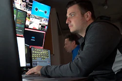 In this Nov. 7, 2019, photo taken from video, technicians monitor video feeds from 38 cameras placed around State Farm Arena in Atlanta in order to produce 3 dimensional video replays.
