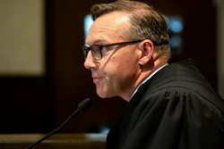 In this Aug. 26, 2019, file photo, Judge Thad Balkman reads a summary of his decision in the opioid trial at the Cleveland County Courthouse in Norman, Okla.