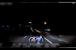 This file image made from video March 18, 2018, of a mounted camera provided by the Tempe Police Department shows an exterior view moments before an Uber SUV hit a woman in Tempe, Ariz.