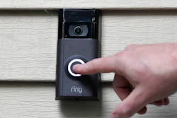 In this July 16, 2019, file photo, Ernie Field pushes the doorbell on his Ring doorbell camera at his home in Wolcott, Conn.