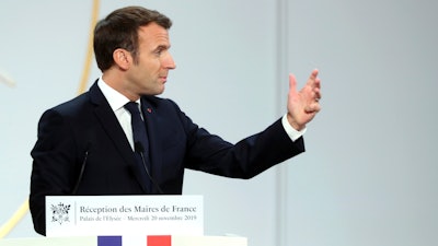 French President Emmanuel Macron delivers a speech at the Elysee Palace, during a meeting with France's mayors, in Paris, Nov. 20, 2019.