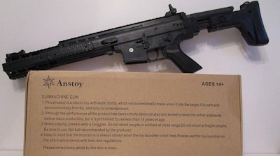 Anstoy's submachine gun is a replica that could be mistaken for lethal weaponry.