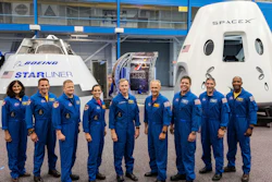 This undated photo made available by NASA on Friday, Aug. 3, 2018 shows, from left, Sunita Williams, Josh Cassada, Eric Boe, Nicole Mann, Christopher Ferguson, Douglas Hurley, Robert Behnken, Michael Hopkins and Victor Glover standing in front of mockups of Boeing's CST-100 Starliner and SpaceX's Crew Dragon capsules at the Johnson Space Center in Texas. On Thursday, Nov. 14, 2019, NASA auditors warned the space agency faces “significant safety and technical challenges” that need to be solved before astronauts fly in private capsules.