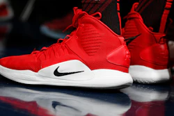 In this Jan. 13, 2019, file photo Portland Trail Blazers forward Zach Collins (33) wears a pair of Nike Hyperdunks in the first half of an NBA basketball game in Denver. Nike is ending a sales partnership with Amazon less than a month after the athletic gear company named e-commerce veteran John Donahoe as its new CEO.