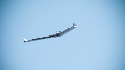 A senseFly eBee X fixed-wing unmanned aircraft system takes to the air outside the U.S. Army Engineering and Support Center in Huntsville, Alabama, during a preliminary survey flight on Oct. 1, 2019.