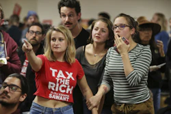 Supporters of Seattle City Council District 3 incumbent candidate Kshama Sawant react as results come in, Nov. 5, 2019, in Seattle.