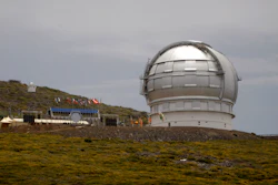 This July 24, 2009 file photo shows the Gran Telescopio Canarias, one of the the world's largest telescopes, at the Observatorio del Roque de los Muchachos on the Canary Island of La Palma, Spain. The director of a Spanish research center says a giant telescope, costing $1.4 billion, is one step nearer to being built on the Canary Islands in the event an international consortium gives up its plans to build it in Hawaii.