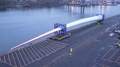 The 107-meter blade arrives in Boston.