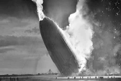 In this May 6, 1937 file photo, the German dirigible Hindenburg crashes to earth in flames after exploding at the U.S. Naval Station in Lakehurst, N.J. Werner Gustav Doehner, the last survivor of the disaster, died Nov. 8, 2019 at age 90 in Laconia, N.H. Doehner was 8-years old when he boarded the zeppelin in Germany with his parents and older siblings to return from a vacation.
