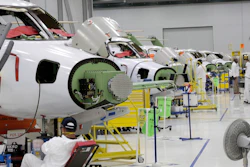 In this July 30, 2019, file photo people work in the production area at the Honda Aircraft Co. headquarters in Greensboro, N.C. where the HondaJet Elite aircraft is manufactured. On Friday, Nov. 1, the Institute for Supply Management, an association of purchasing managers, reports on activity by U.S. manufacturers in October.