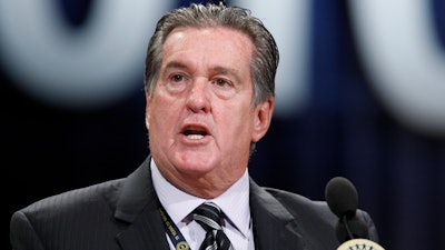 In this June 17, 2010 file photo, United Auto Workers Vice President Joe Ashton addresses the autoworker's convention in Detroit. The retired vice president is the latest to be charged in a corruption scandal at the United Auto Workers union. Ashton is accused of getting thousands of dollars in kickbacks from a contractor who made watches for union members.