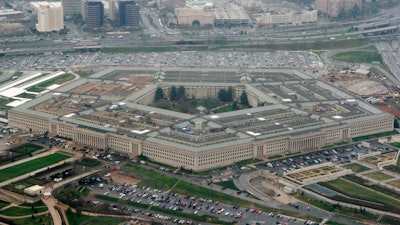 This March 27, 2008, aerial file photo, shows the Pentagon in Washington. Amazon is protesting the Pentagon’s decision to award a huge cloud-computing contract to Microsoft, citing “unmistakable bias” in the decision. Amazon’s competitive bid for the “war cloud” drew criticism from President Donald Trump and its business rivals.