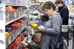 A shopper looks at extension cords at B&C Ace hardware store, Tuesday, Nov. 19, 2019, in Grass Valley, Calif., in preparation of the planned Pacific Gas & Electric power shutdown scheduled for Wednesday and Thursday.
