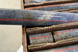 In this Oct. 4, 2011, file photo, a core sample drilled from underground rock near Ely, Minn., shows a band of shiny minerals containing copper, nickel and precious metals, center, that Twin Metals Minnesota LLC, hopes to mine near the Boundary Waters Canoe Area Wilderness in northeastern Minnesota. Minnesota officials say they will do a state environmental impact statement for a proposed copper-nickel mine upstream of the Boundary Waters Canoe Area.