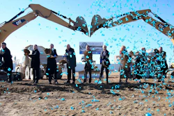 Tennessee officials, Chattanooga officials and Volkswagen officials pose for a photo during the groundbreaking event for the Volkswagen electric vehicle facility at the Volkswagen plant Wednesday, Nov. 13, 2019 in Chattanooga, Tenn. Volkswagen is making Tennessee its North American base for electric vehicle production, breaking ground on an $800 million expansion at the plant in Chattanooga.