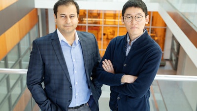 Electrical and computer engineering professor Can Bayram, left, and graduate student Kihoon Park.