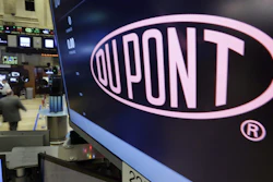 In this Dec. 9, 2015, file photo, the Dupont logo above its trading post on the floor of the New York Stock Exchange.