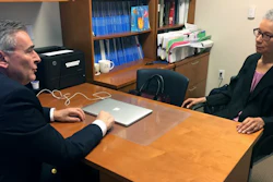 In this May 24, 2018, photo, Adine Usher, 78, meets with breast cancer study leader Dr. Joseph Sparano at the Montefiore and Albert Einstein College of Medicine in the Bronx.
