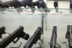 This June 29, 2016, file photo shows guns on display at a gun store in Miami.