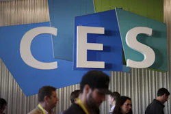 In this Jan. 6, 2017, file photo, attendees walk past the CES sign at CES International in Las Vegas.