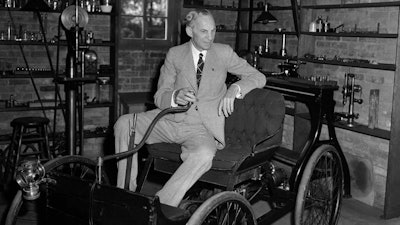In this July 30, 1942, file photo, Henry Ford visits the shop where he built his first automobile in Detroit.