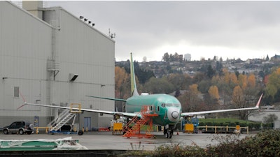 In this Nov. 14, 2018, file photo a Boeing 737-MAX 8 is parked outside Boeing Co.'s 737 assembly facility in Renton, Wash.