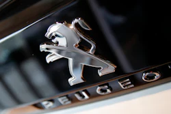 In this Feb. 23, 2017, file photo, the logo of Peugeot is pictured during the presentation of the company's 2016 full year results in Paris.