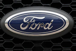 This Feb. 17, 2019, file photo shows the grille of an unsold 2019 F150 pickup truck at a dealership in Broomfield, Colo.
